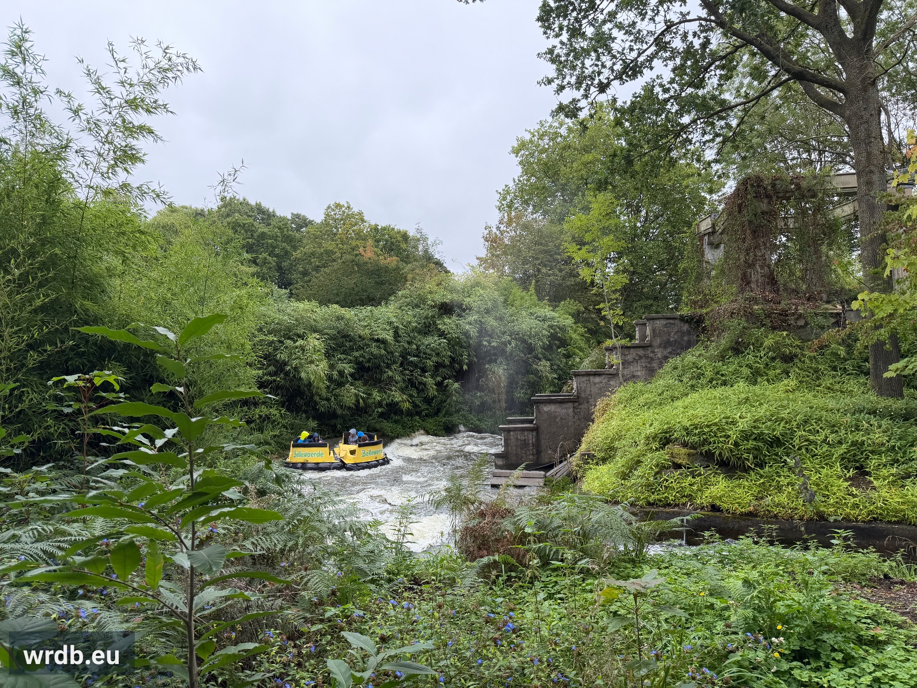one of the boats rafting next to a themed temple